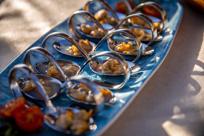 A 2 hours Local Tapas and sailing adventure in Barcelona - A small boat, a short guest list, and a calmer pace