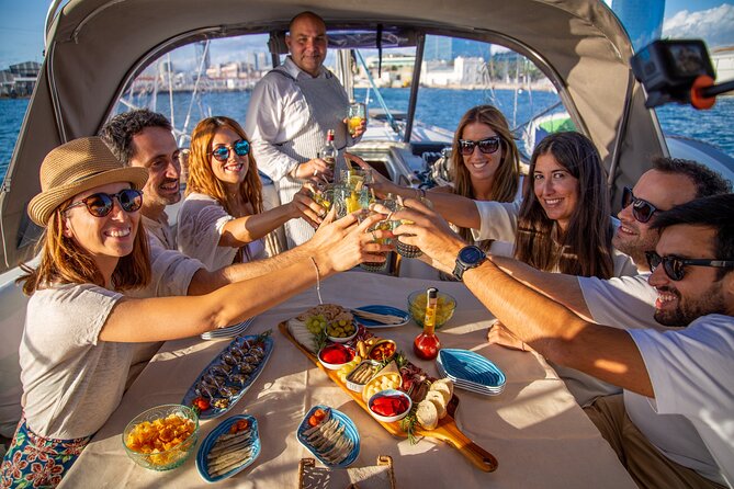A 2 hours Local Tapas and sailing adventure in Barcelona - Columbus Monument and Barceloneta Beach