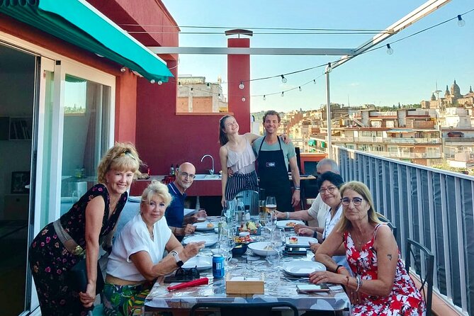 Barbecue in a penthouse in the center of Barcelona with a chef - Cava, cured ham, and a gentle start