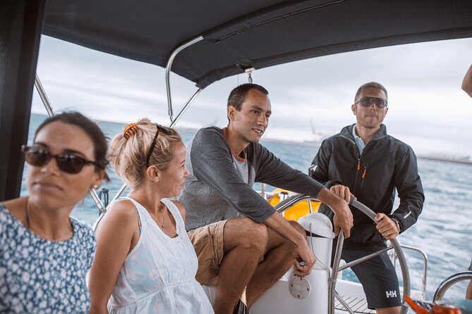 Barcelona 1-hour Boat Trip with Cava and Snacks - Cava, water, snacks, and the skipper