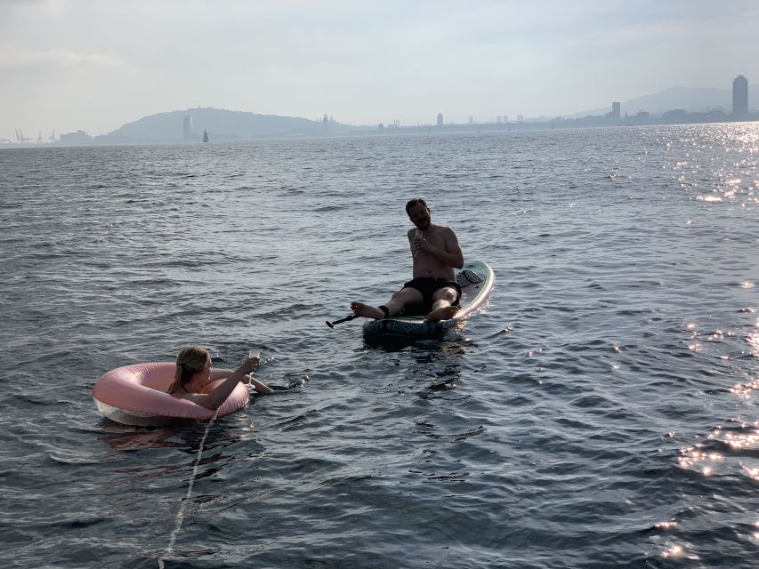 Barcelona: 2-Hour Sailboat Tour with Paddle Boarding - Cava, Snacks, and the Return to Port Olímpic