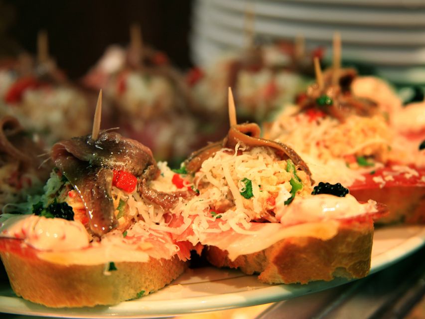 Barcelona: 4-Hour Tapas Evening Tour and Flamenco Show - Three to four tapas and one drink