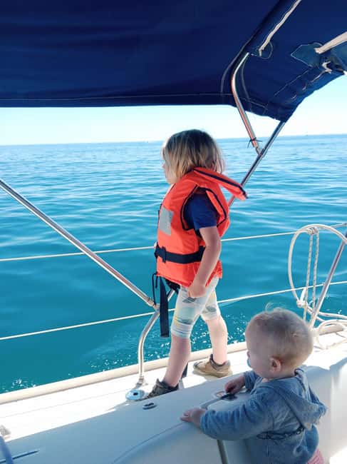 Barcelona Badalona : Sailboat Tour, Snacks, Drinks, Swimming - Sunset departures and the changing light