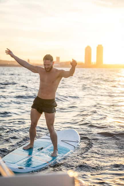 Barcelona Badalona : Sailboat Tour, Snacks, Drinks, Swimming - Boarding the 36-foot French sailboat