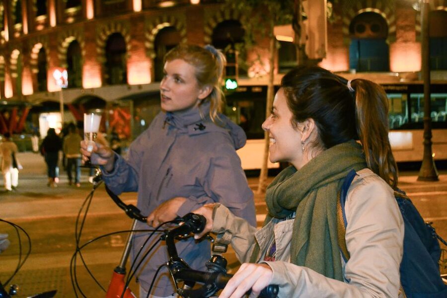 Barcelona Bike Tour by Night with Cava - The return ride passes two illuminated landmarks