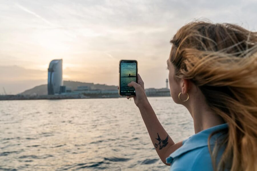 Barcelona: Boat Trip and Panoramic Helicopter Flight - Sailing the Barcelona Coast on the Orsom