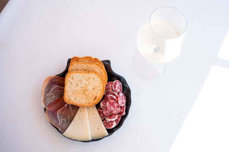 Barcelona: Catamaran Cruise w/ Sailing, Wine, & Tapa - Wine, cava, beer, and a simple tapa