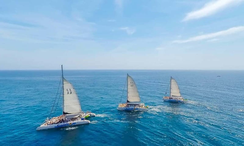 Barcelona: Catamaran Party Cruise with BBQ Meal - Sailing from Barcelona toward Badalona