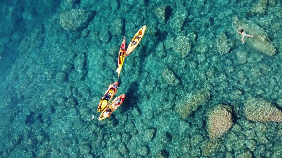 Barcelona: Costa Brava Kayak, Snorkel & Cliff Jump & Lunch - Guides, group energy, and photographs