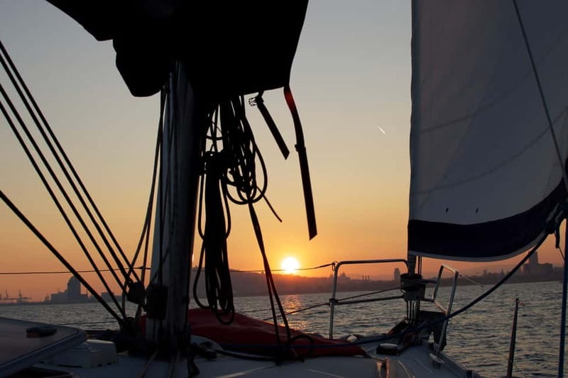 Barcelona: Daytime or Sunset Cruise with Drinks - A welcome drink, music, and the chance to handle the sails