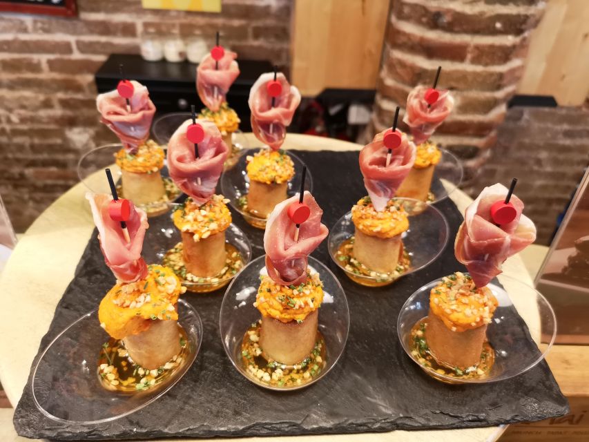 Barcelona: Food & Drink Tasting Tour in Traditional Taverns - La Boqueria adds color and market energy