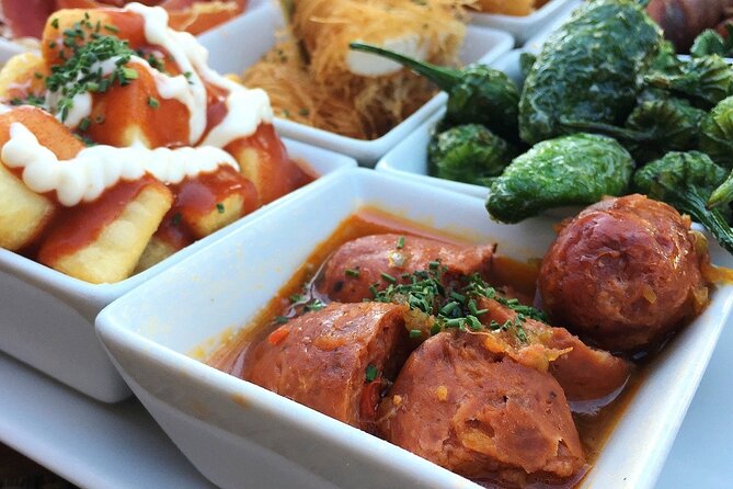Barcelona Food Tour: Tapas, Drinks and Delights with a Local - Carrer de la Mercè and the first glass of vermouth