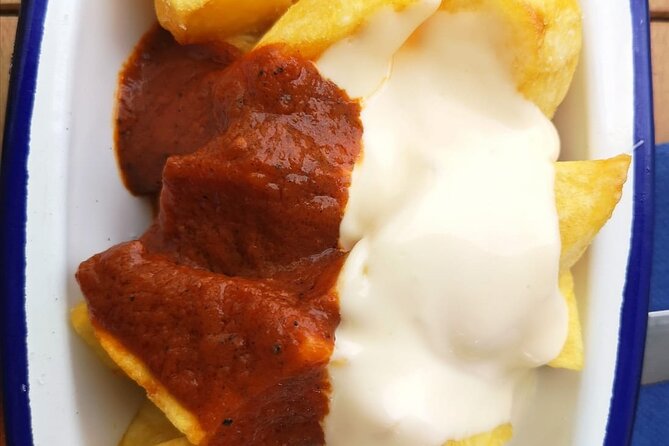Barcelona Food Tour: Tapas, Drinks and Delights with a Local - Plaça de Sant Josep Oriol and pintxos