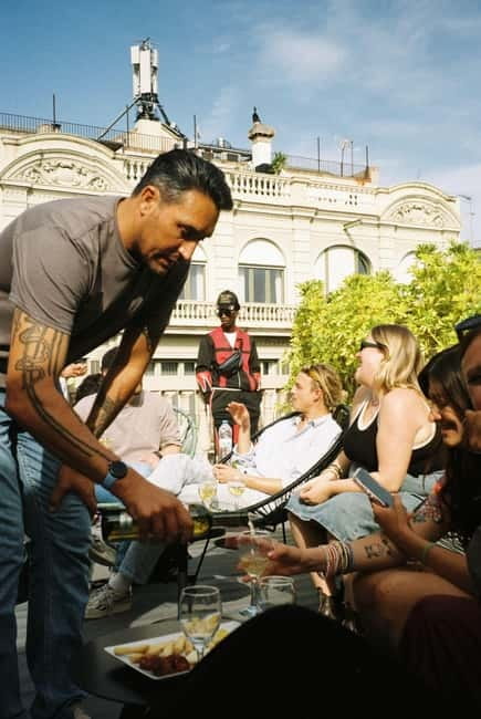 Barcelona: Fun & Unpretentious Rooftop Wine Tasting - The rooftop setting and sunset timing