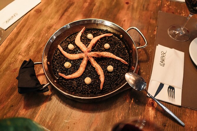 Barcelona: Guided Food Walking Tour with Tapas and Wine - Entering El Born through Carrer dels Banys Vells