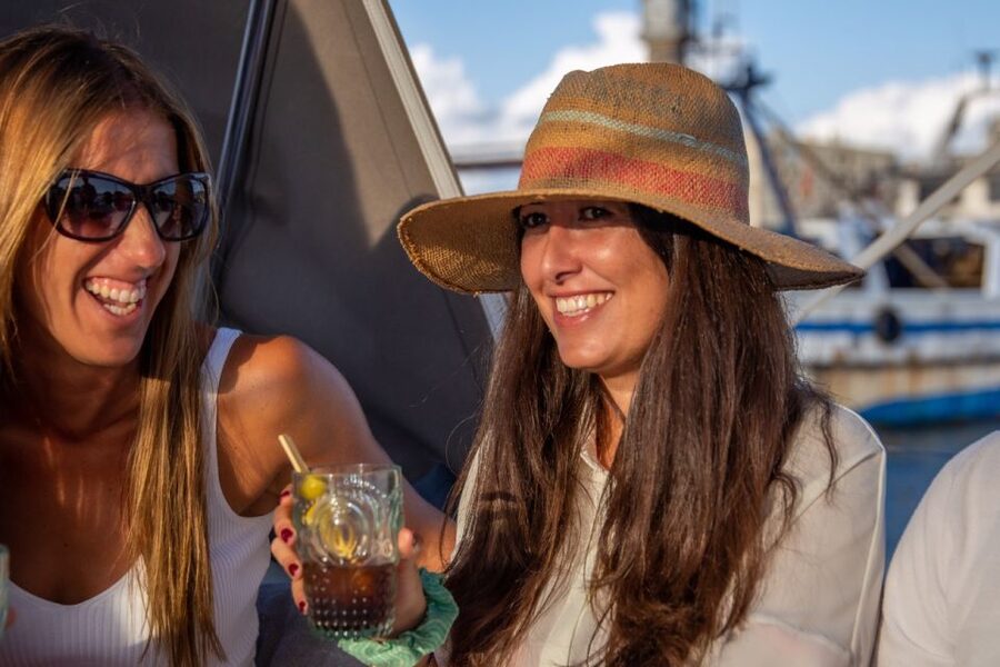 Barcelona: Local Tapas and Drinks Sailing Adventure Tour - The first taste: seafood conserves and local bites