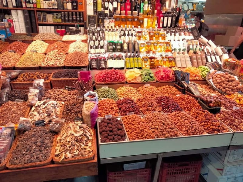 Barcelona: Markets Tour With Food and Wine Tasting Upgrade - The caganer shop and a strange Catalan custom