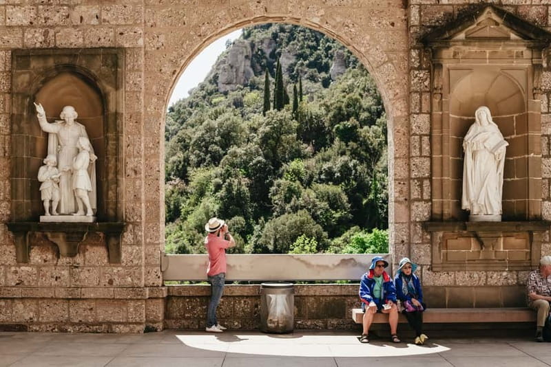 Barcelona: Montserrat and Winery Tour with Tapas or Lunch - Riding the cogwheel train into the mountains