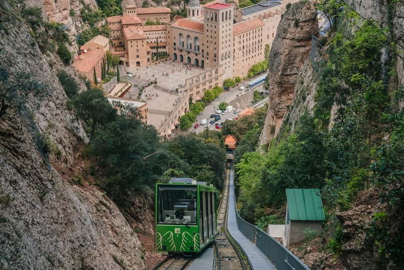 Barcelona: Montserrat Monastery and Black Madonna Day Trip - Taking the Sant Joan funicular uphill