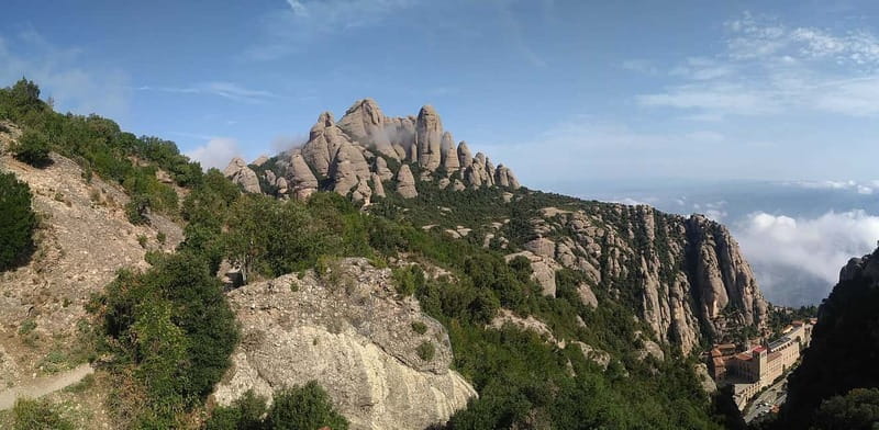Barcelona: Montserrat Monastery and Natural Park Guided Tour - Free time, local food, and the return to Barcelona