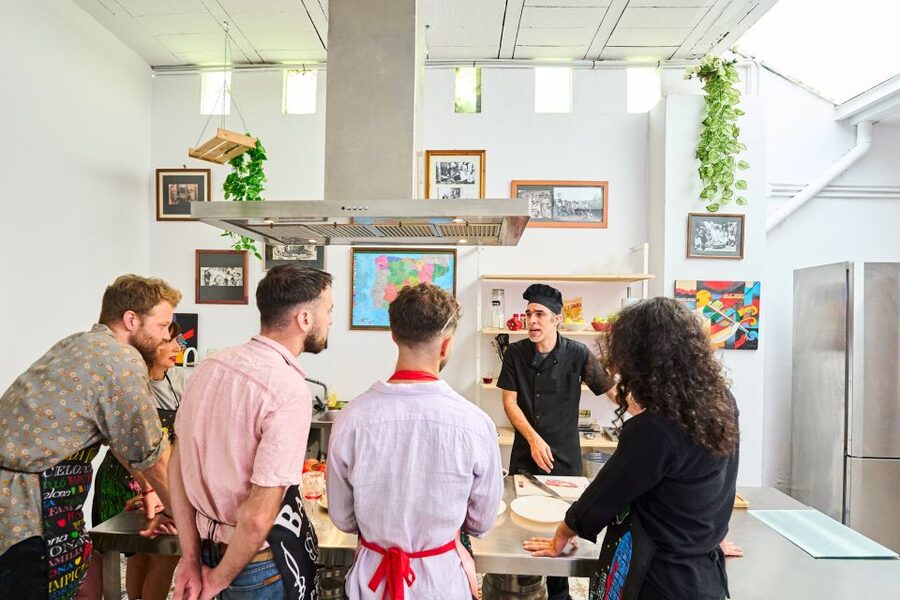 Barcelona: Paella Cooking Class with Market Visit and More - What the chefs add to the experience