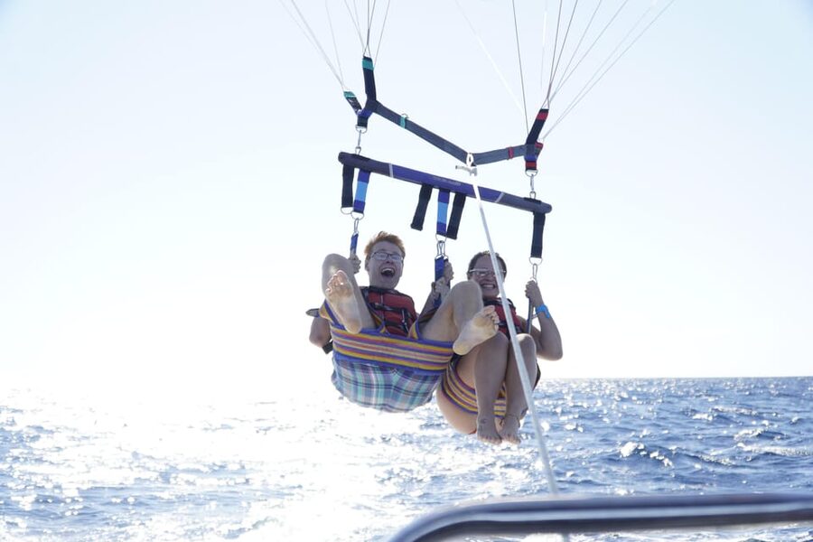 Barcelona: Parasailing with 360º Panoramic Skyline Views - The harness, lift, and flight