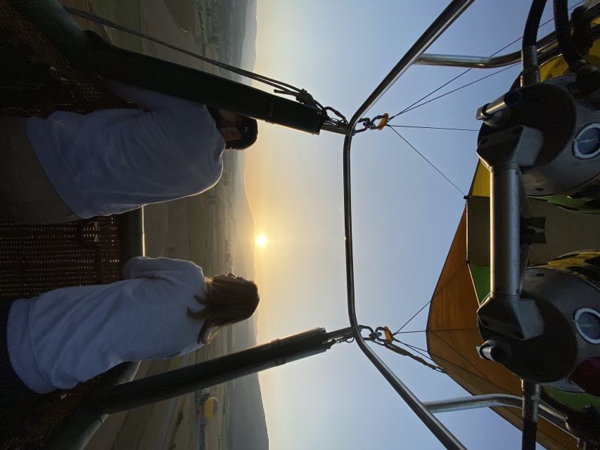 Barcelona: Private Hot Air Balloon Ride - Watching the balloon rise before sunrise