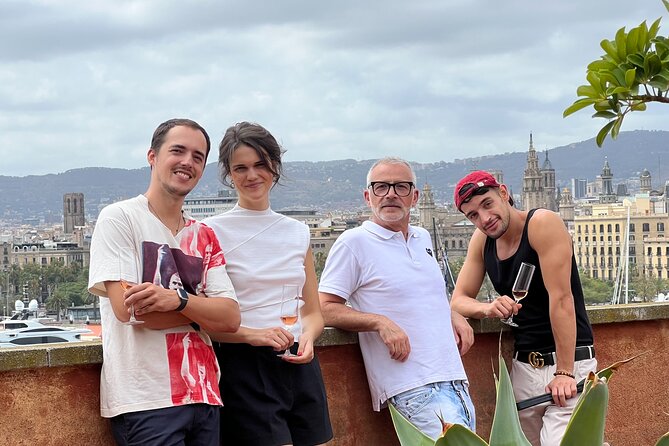Barcelona: Rooftop Tapas & Sangria class with a Local Chef - Mixing sangria and sharing the work
