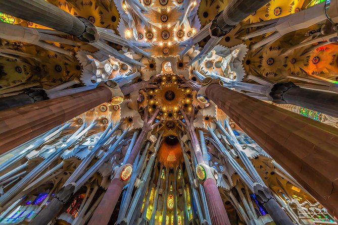 Barcelona: Sagrada Familia Fast Track Tour with Tower Option - Inside the basilica: light, structure, and symbols