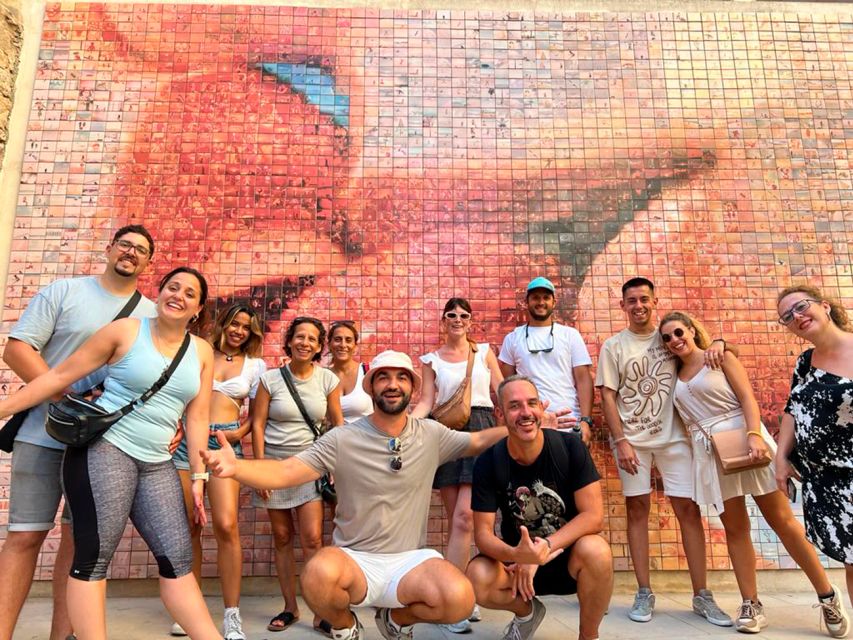 Barcelona: Sagrada Familia, Modernism, and Old Town Tour - Starting beneath the blue umbrellas at Sagrada Família