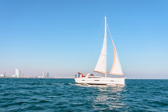 Barcelona Sailing: Light Snacks & Open Bar with Private Option - Open water, fresh air, and skyline views