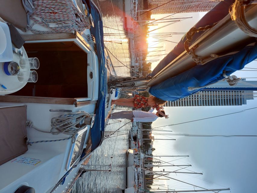 Barcelona Sailing Tour Drinks, snacks Swim & Stunning Views - Watching the coast at sunset