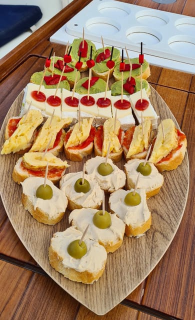 Barcelona: Sailing Tour with Spanish Tapas and Drinks - Tapas, snacks, and the 9:30 brunch difference