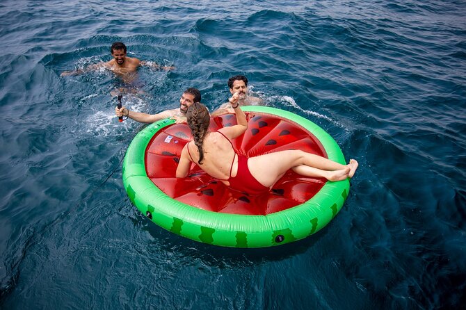 Barcelona Sailing Tour with Swimming, Snacks and Drinks - Barceloneta and the city’s beach side