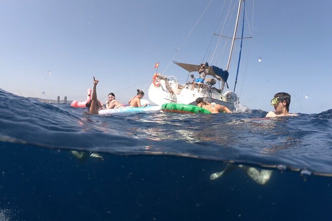 Barcelona Sailing Tour with Swimming, Snacks and Drinks - Snacks, wine, and the relaxed onboard mood