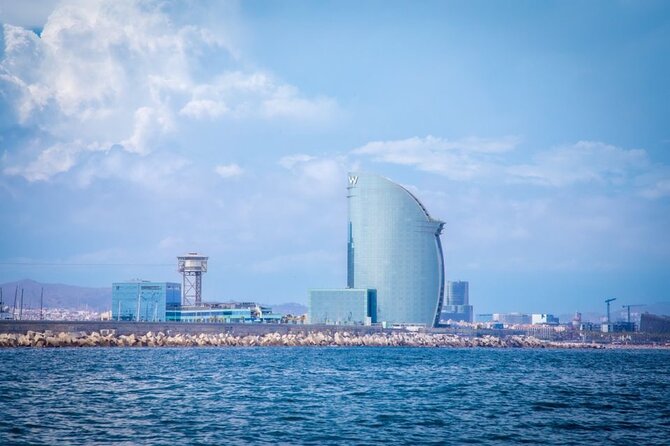 Barcelona Sailing Tour with Swimming, Snacks and Drinks - Seeing the Sagrada Família from offshore