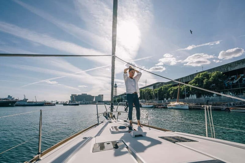 Barcelona: Sailing Tour with Tapas, Drinks and Swim Stop - Sailing past Barceloneta Beach