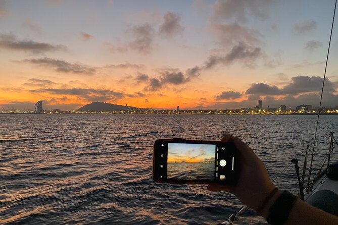 Barcelona Sensational Sunset Tour with Open Bar and Snacks - The skippers shape the evening