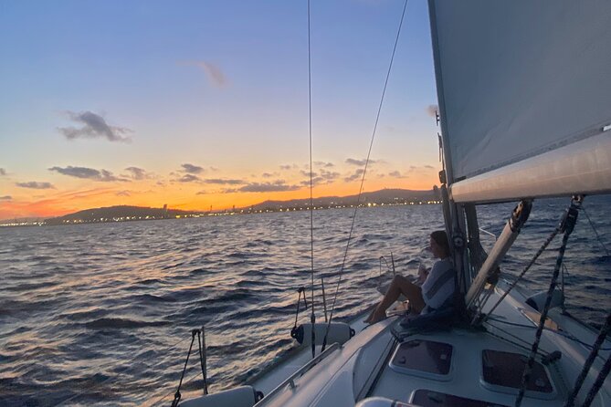 Barcelona Sunset and Day Sailing Cruise - Sunset light, cava, and a simple snack spread