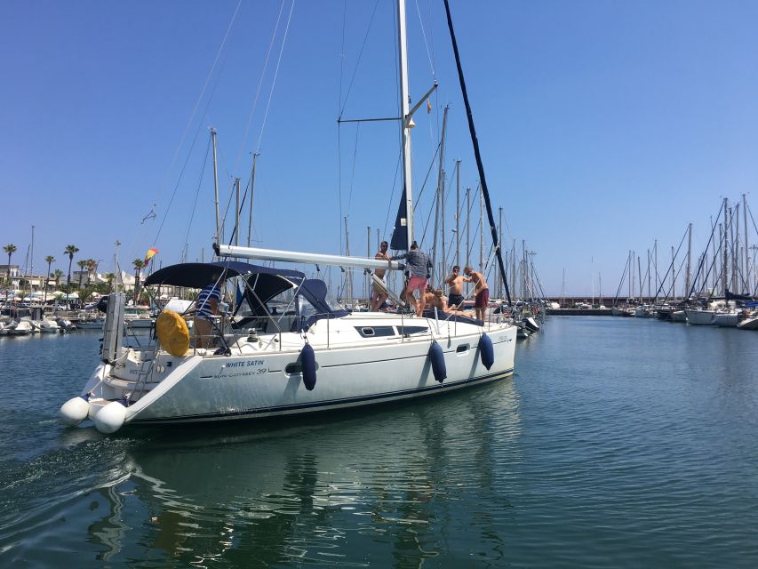 Barcelona: Sunset Boat Trip with Cava Wine and Snacks - The skipper can shape the mood
