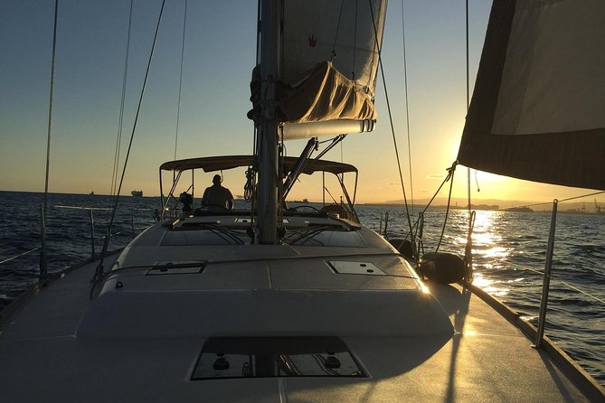 Barcelona Sunset Cruise with Light Snacks and Open Bar - Weather, swimming, and the limits of a sea-based plan