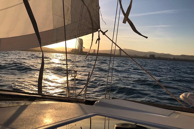 Barcelona Sunset Cruise with Light Snacks and Open Bar - Leaving Port Vell beside Barcelona’s old waterfront