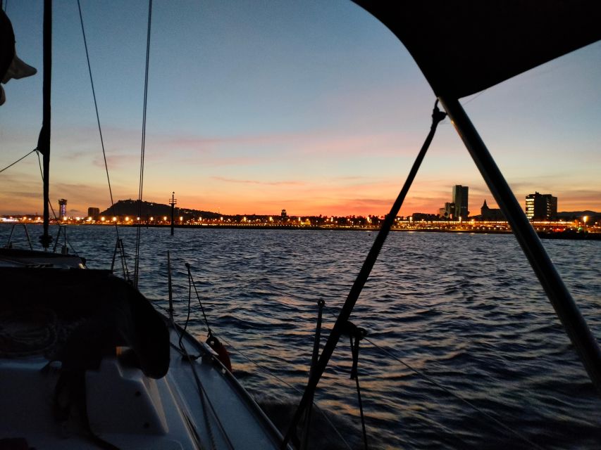 Barcelona: Sunset Cruise with Snacks and Drinks - Sunset, city lights, and the best photographs