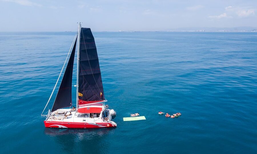 Barcelona: Sunset or Day Catamaran Cruise with Tapa & Drink - Leaving from Marina Vela beside Barceloneta