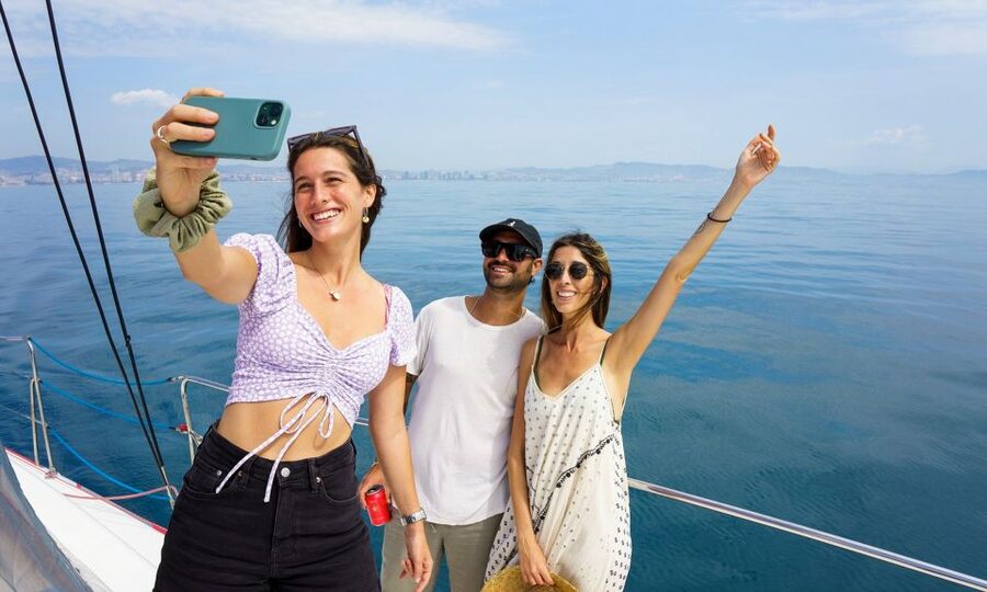 Barcelona: Sunset or Day Catamaran Cruise with Tapa & Drink - The daytime cruise and its 30-minute swim stop