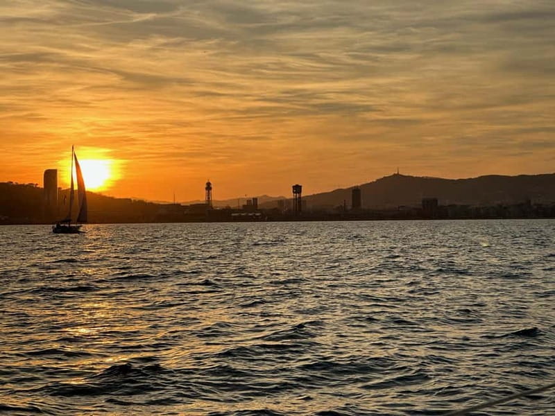 Barcelona: Sunset Sailboat Cruise with Open Bar and Snacks - The sunset hour near Barceloneta