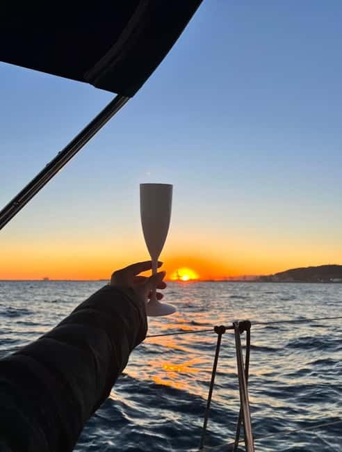 Barcelona: Sunset Sailboat Cruise with Open Bar and Snacks - From Olympic Port to Barceloneta Beach