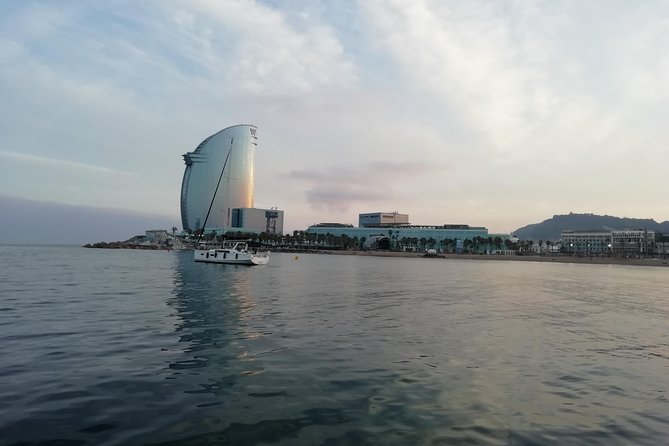 Barcelona Sunset Sailing Cruise from Port Olímpic with Open Bar - Open-bar drinks and onboard snacks