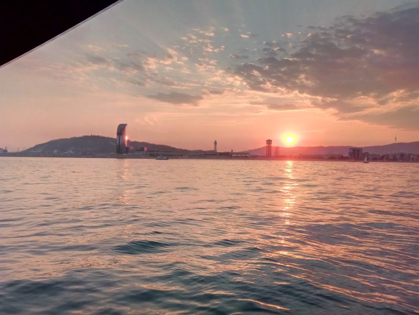 Barcelona: Sunset Sailing Tour with Open Bar & Snacks - Drinks, simple snacks, and a relaxed pace