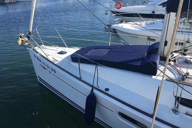 Barcelona Sunset Sailing with Open Bar of Cava and Snacks - Wind, cold, and seasickness